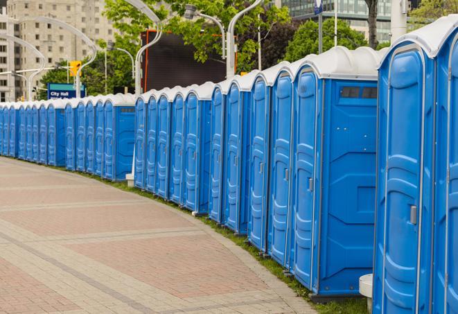 a row of portable restrooms at a fairground, offering visitors a clean and hassle-free experience in hawkcove